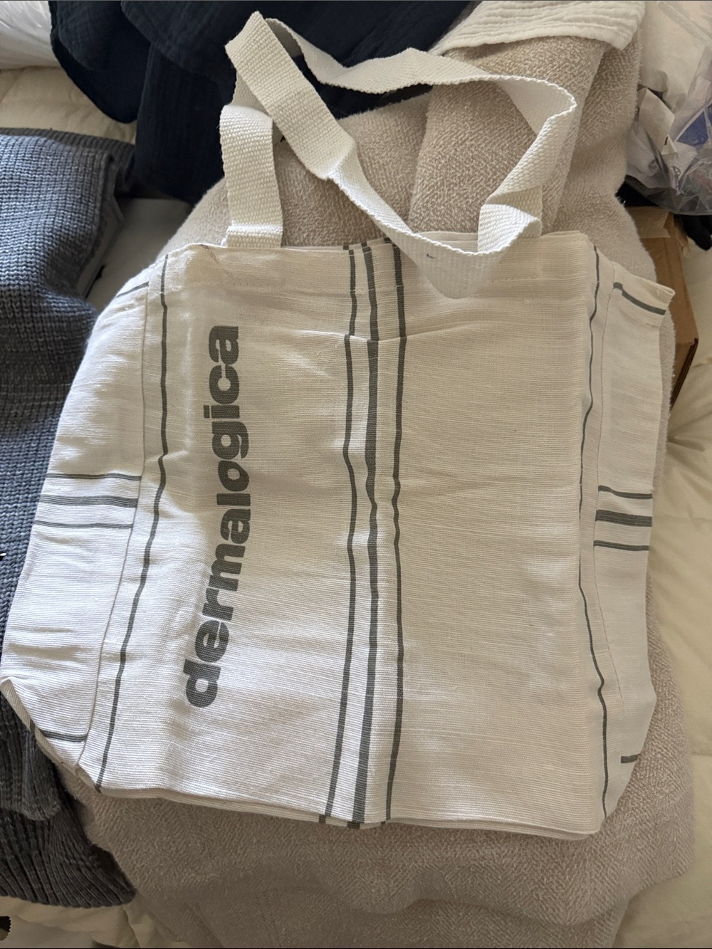 dermalogica Cream Canvas Messenger Tote with Gray Stripes